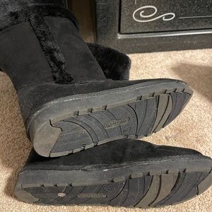 Black fluffy calf high boots